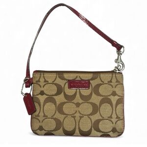 Classic Coach Signature wristlet in khaki canvas